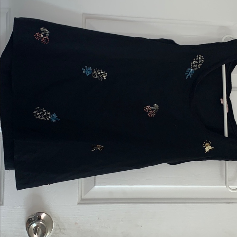 Black over the shoulder blouse with fruit jewels